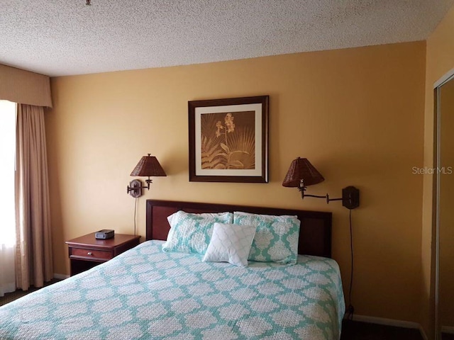 bedroom featuring a textured ceiling