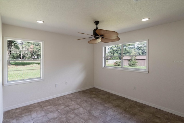 empty room featuring ceiling fan