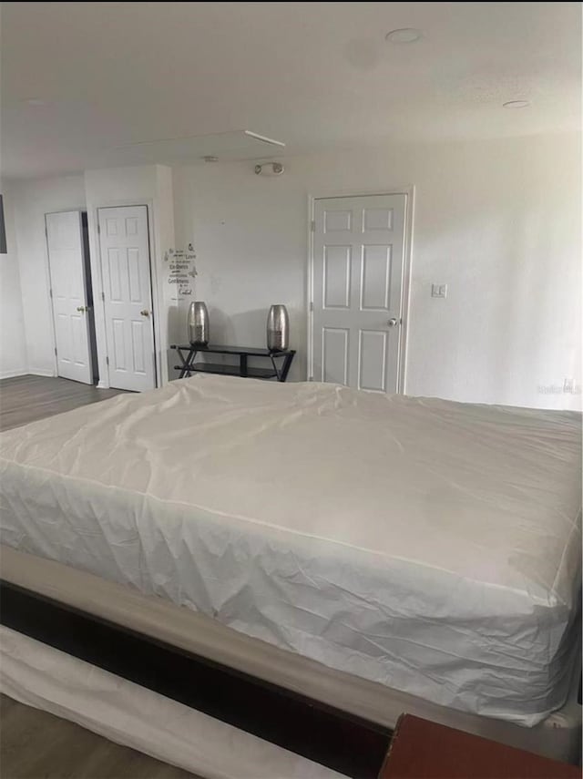 1801 Daniels St, Kissimmee, FL 34746 - bedroom featuring wood finished floors