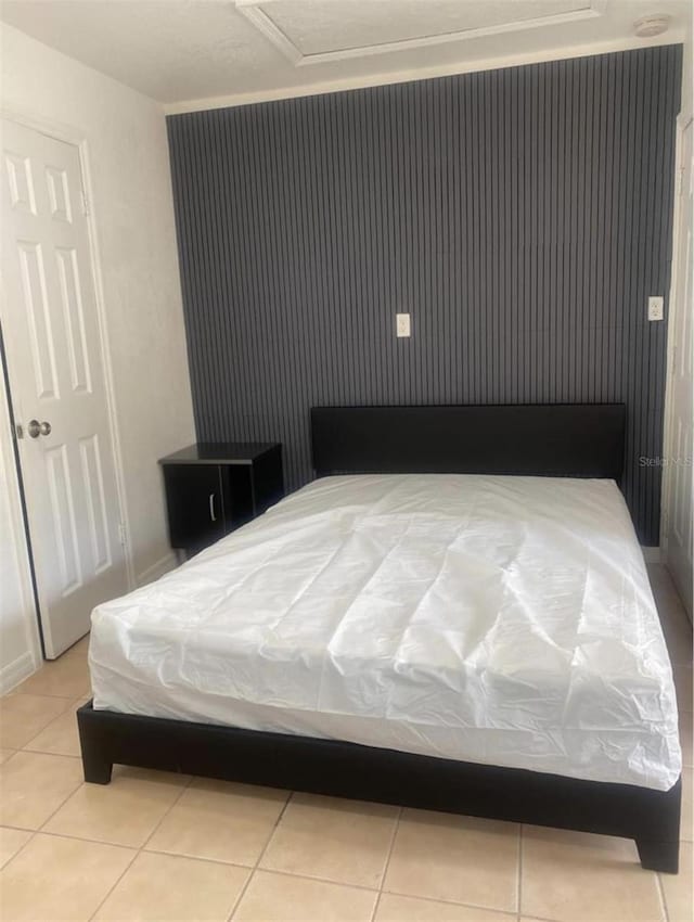 1801 Daniels St, Kissimmee, FL 34746 - tiled bedroom with attic access