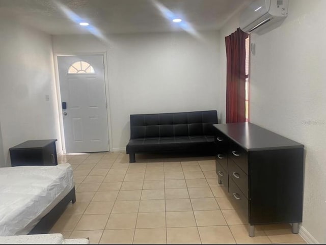 1801 Daniels St, Kissimmee, FL 34746 - foyer featuring a wall unit AC, light tile patterned flooring, baseboards, and recessed lighting