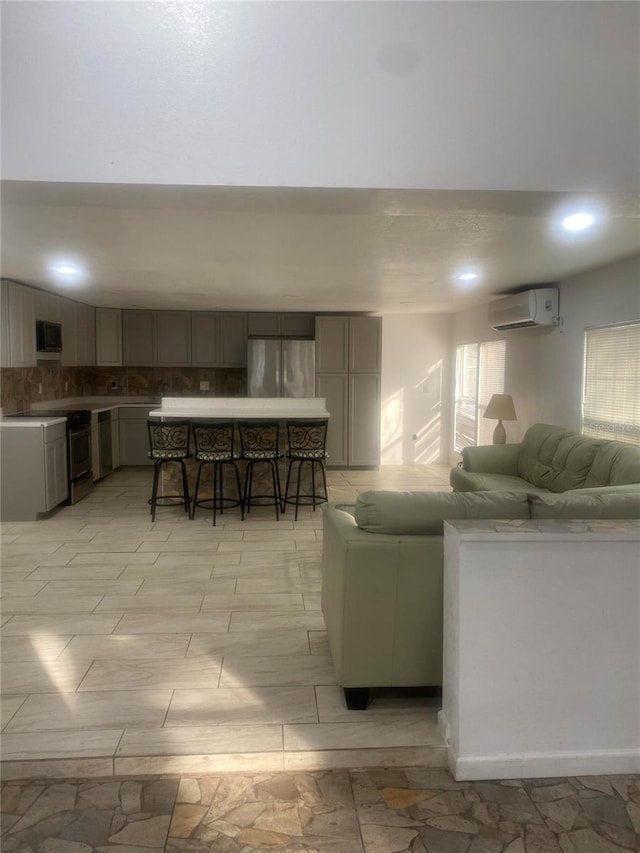 1801 Daniels St, Kissimmee, FL 34746 - living area with a wall unit AC