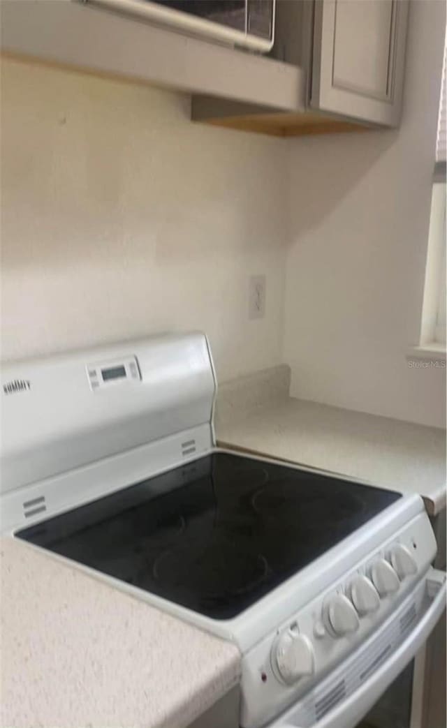 interior details featuring white range oven