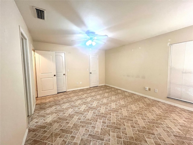 unfurnished bedroom with ceiling fan