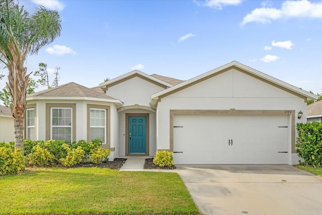 ranch-style home with a front yard and a garage