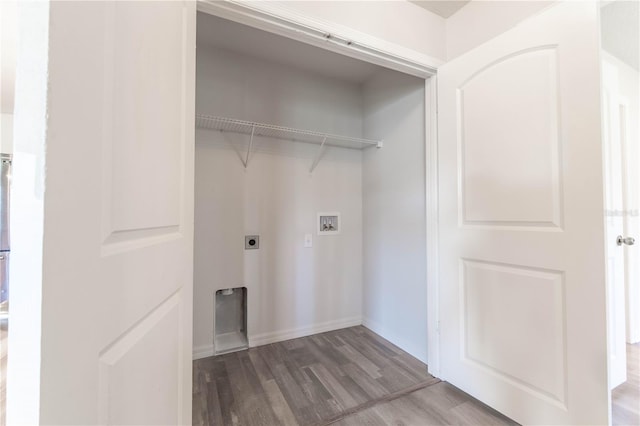 clothes washing area with electric dryer hookup, hookup for a washing machine, and hardwood / wood-style flooring