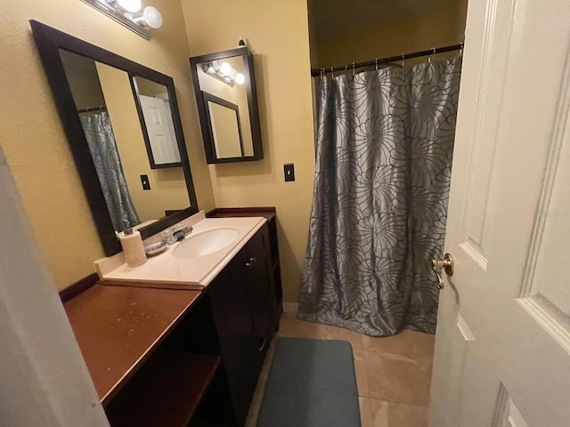 bathroom with vanity and tile patterned floors