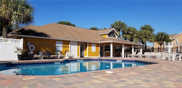 view of swimming pool with a patio area