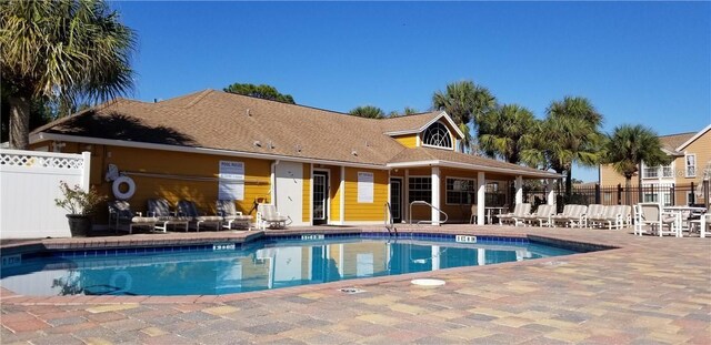 2456 Sweetwater Club Cir Unit 20, Kissimmee, FL 34746 - community pool with a patio