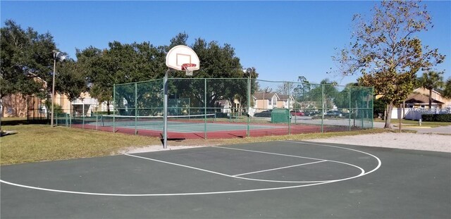 2456 Sweetwater Club Cir Unit 20, Kissimmee, FL 34746 - view of basketball court featuring a tennis court and community basketball court