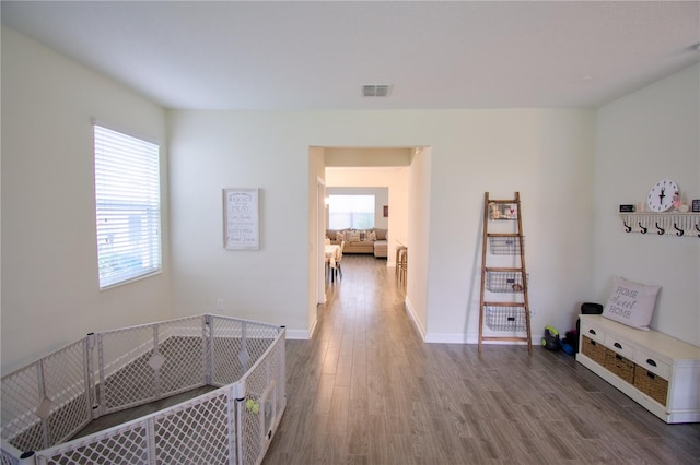 hall featuring hardwood / wood-style flooring