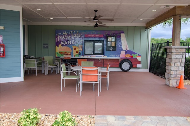 view of patio featuring ceiling fan