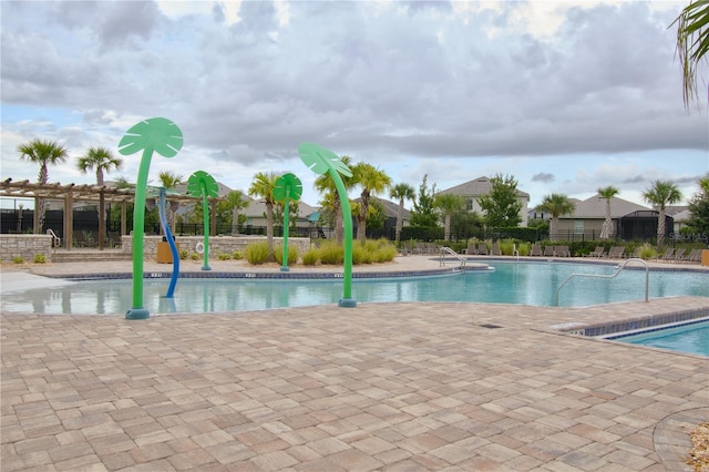 view of swimming pool with a patio