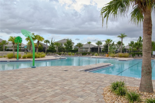 view of swimming pool featuring a patio