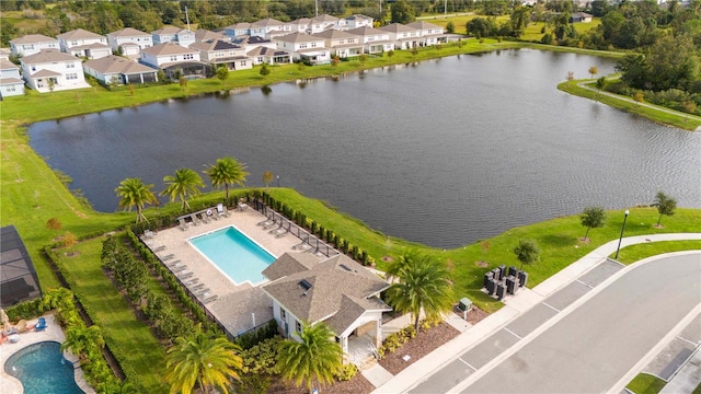 drone / aerial view featuring a water view