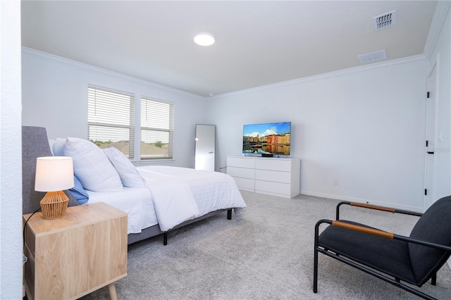 bedroom featuring ornamental molding and light colored carpet