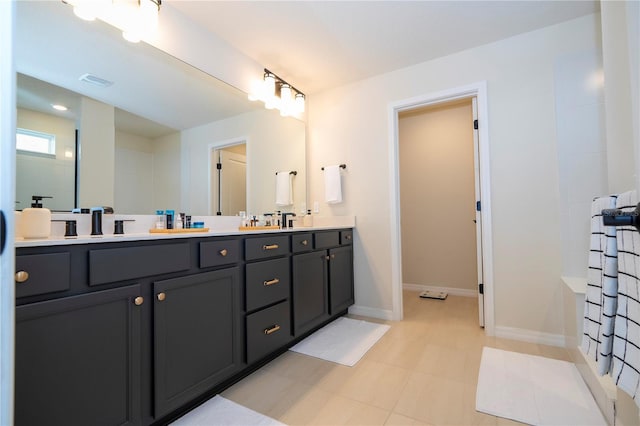 bathroom featuring vanity and tile patterned floors