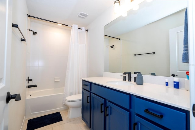 full bathroom featuring vanity, toilet, tile patterned floors, and shower / bath combo with shower curtain