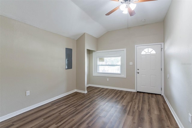 foyer entrance featuring electric panel, ceiling fan, dark hardwood / wood-style floors, and lofted ceiling