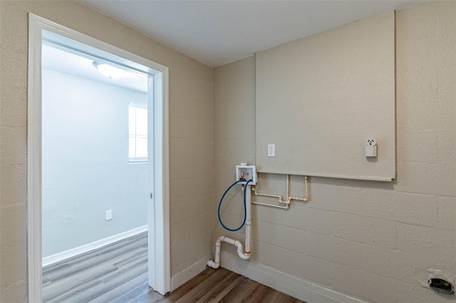 washroom featuring washer hookup and hardwood / wood-style flooring