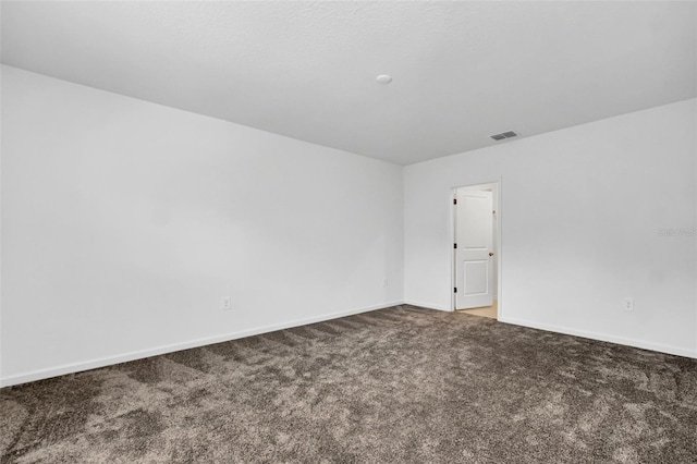 spare room with carpet floors