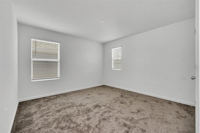 view of carpeted spare room