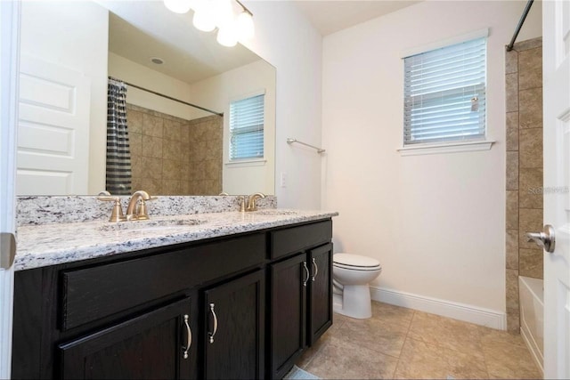 full bathroom featuring vanity, toilet, shower / bath combination with curtain, and tile patterned flooring