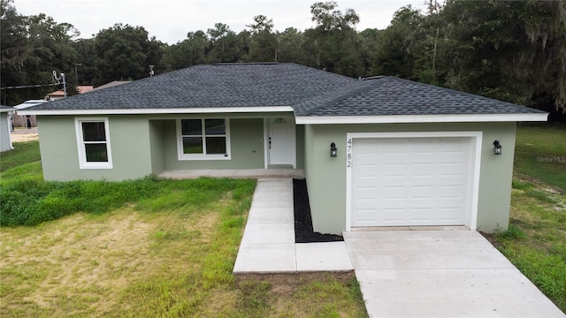 ranch-style house with a front yard and a garage