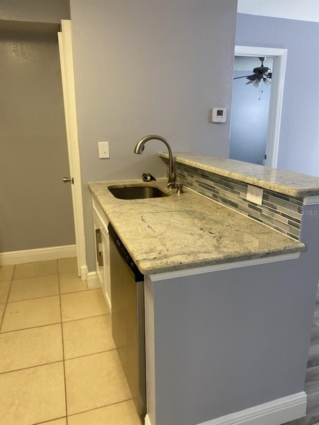 bathroom with vanity, tasteful backsplash, tile patterned floors, and ceiling fan