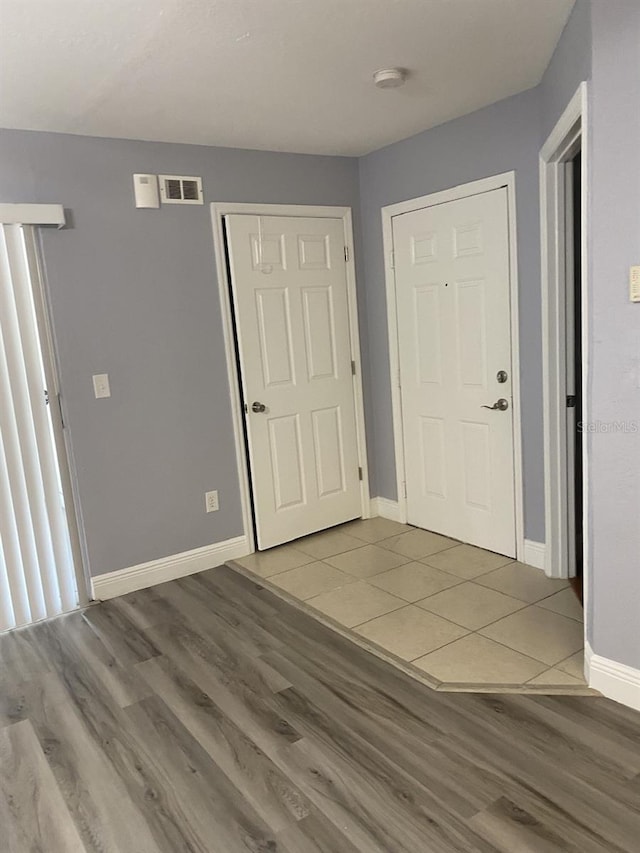 foyer entrance featuring light wood-type flooring