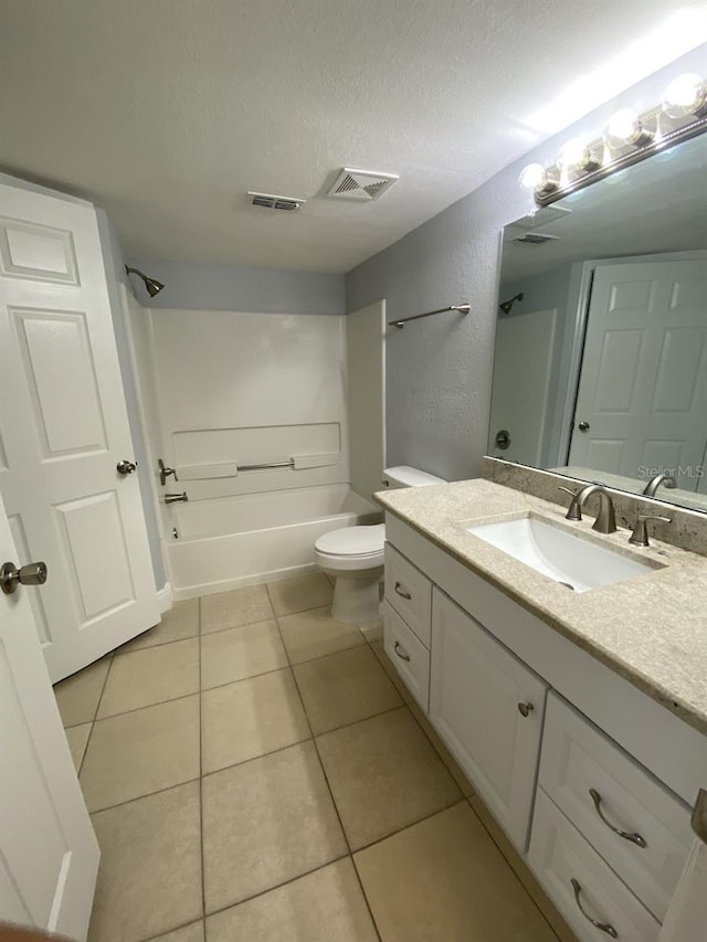 full bathroom with bathtub / shower combination, vanity, toilet, and tile patterned floors