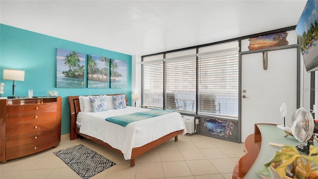 bedroom featuring light tile patterned floors