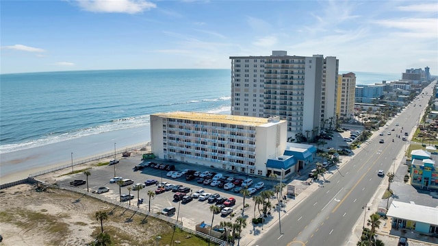 aerial view featuring a water view and a view of the beach