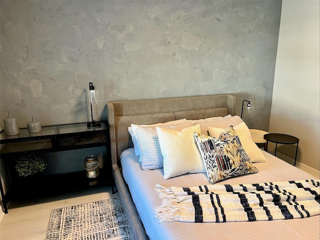 bedroom featuring wood-type flooring