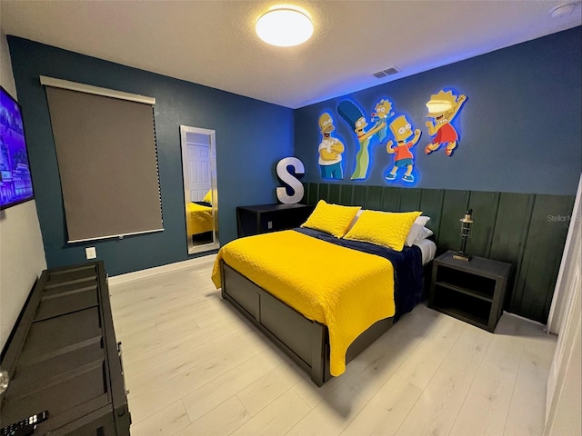 bedroom featuring light hardwood / wood-style floors