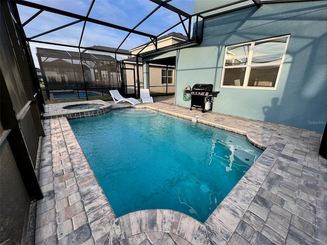 view of pool featuring an in ground hot tub, a patio, a lanai, and grilling area