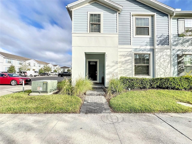 view of front of house with a front lawn