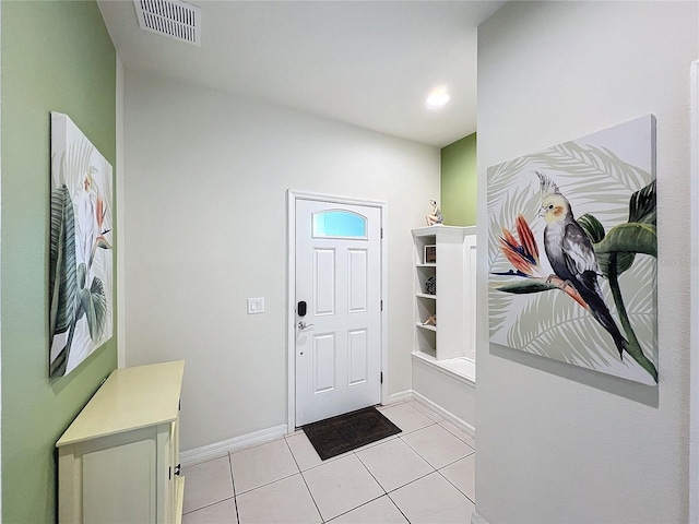 entryway featuring light tile patterned floors