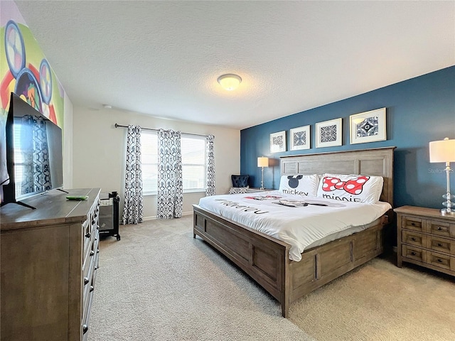 carpeted bedroom with a textured ceiling