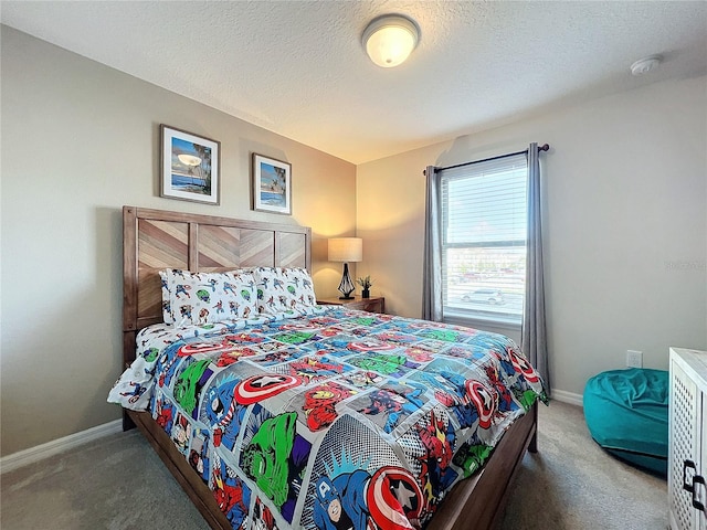 carpeted bedroom with a textured ceiling