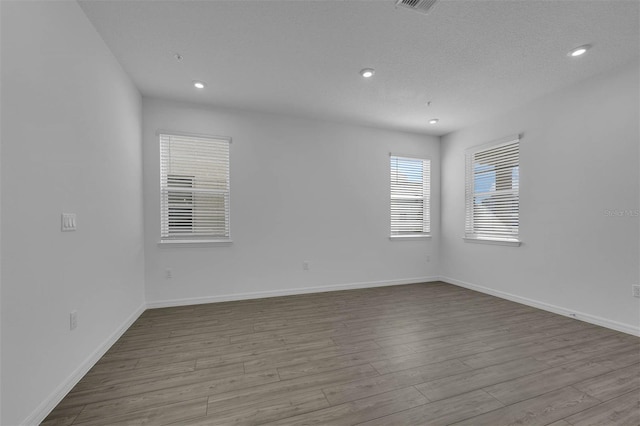 empty room featuring light hardwood / wood-style floors