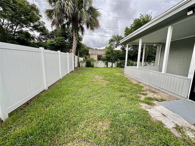 view of yard with fence