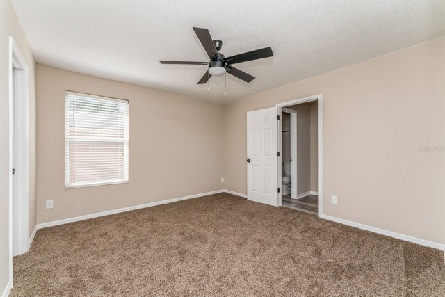 1344 Holly Glen Run, Apopka, FL 32703 - spare room featuring carpet floors, a ceiling fan, and baseboards