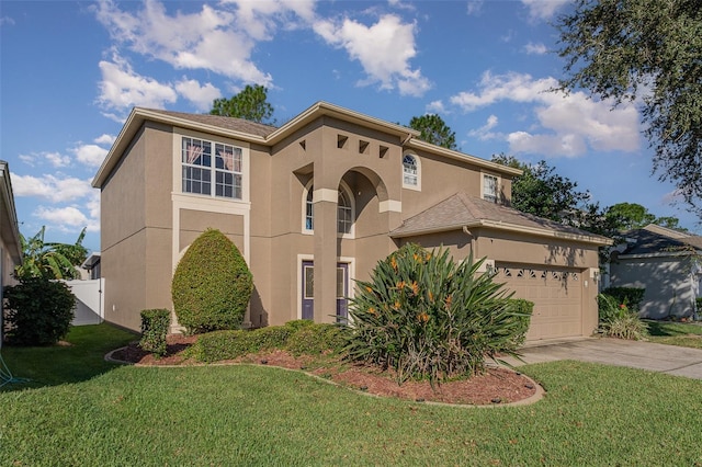 mediterranean / spanish-style home with a front lawn