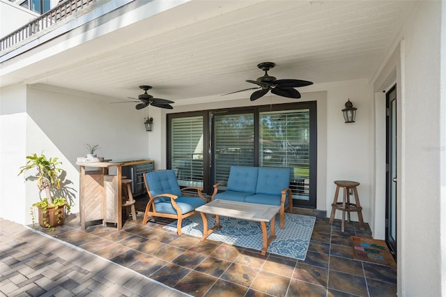 view of patio with ceiling fan