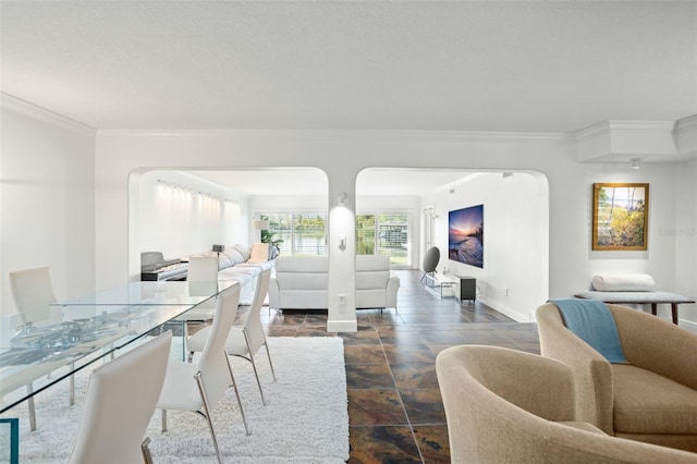 dining space featuring ornamental molding