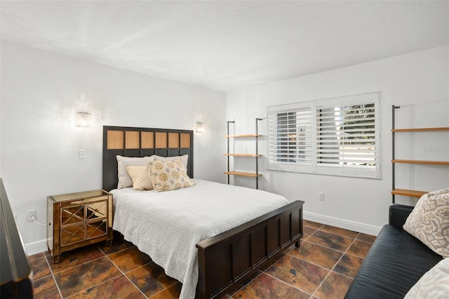 8984 Houston Pl Unit 103, Orlando, FL 32819 - bedroom with baseboards