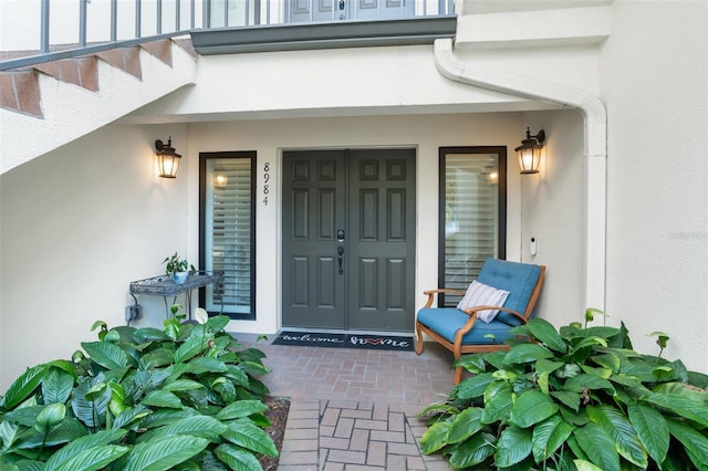 8984 Houston Pl Unit 103, Orlando, FL 32819 - doorway to property featuring stucco siding