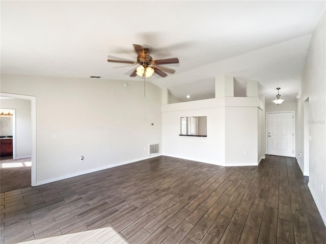 unfurnished living room featuring lofted ceiling, dark wood-type flooring, and ceiling fan