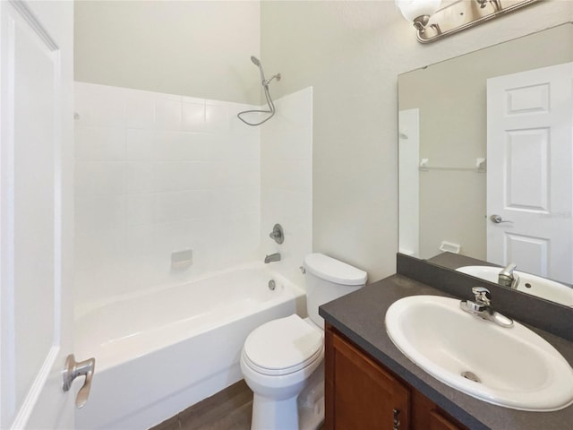 full bathroom featuring vanity, hardwood / wood-style flooring, toilet, and bathing tub / shower combination